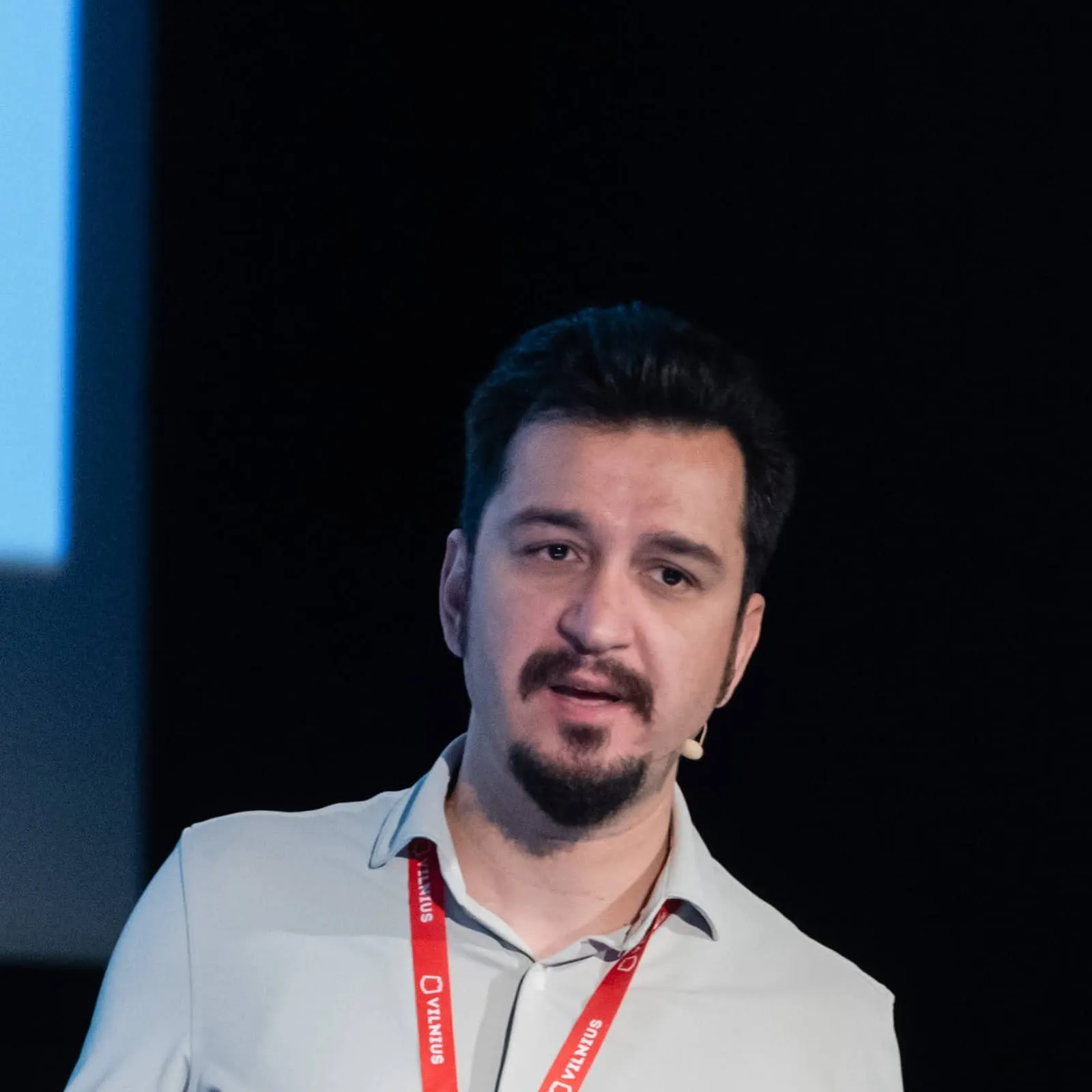 Halil İbrahim Kalkan speaking at a conference